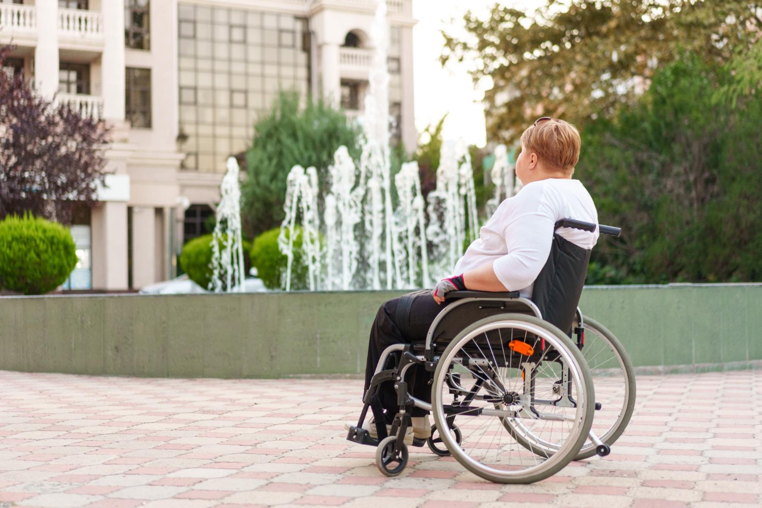 Illustration of a person using a wheelchair