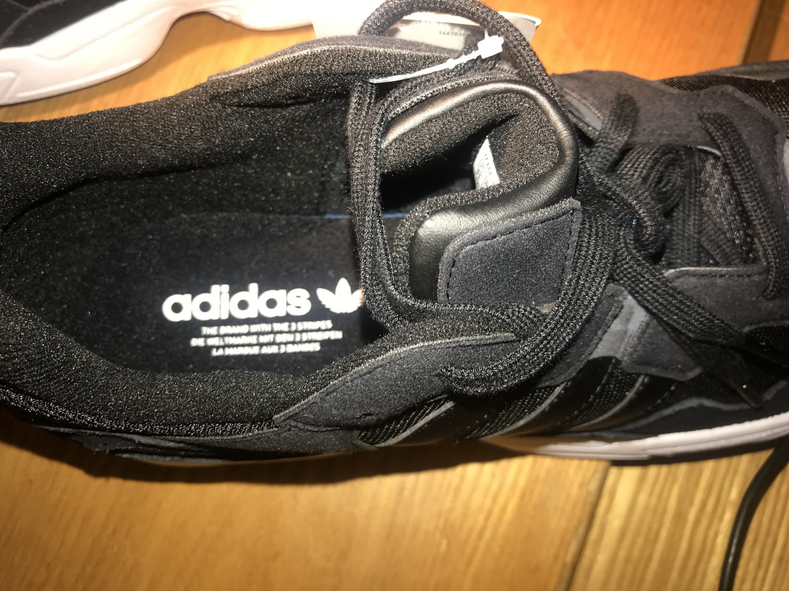 Picture of the inside of the adidas trainers showing the adidas label